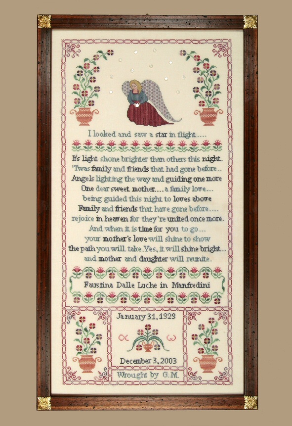 a sampler dedicated to a mother with an angel and flowers